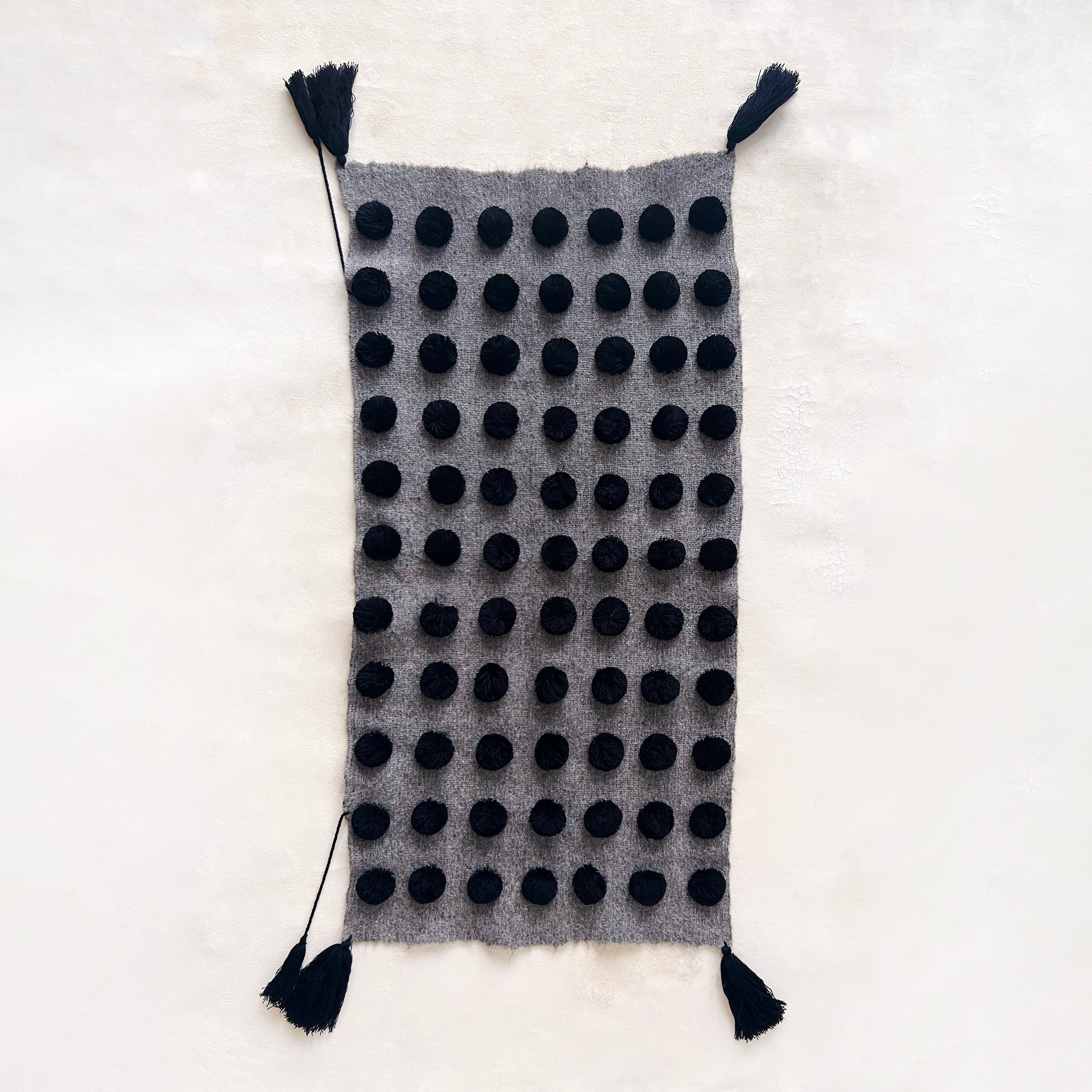 Wool Pom Wall Hanging in Grey and Black