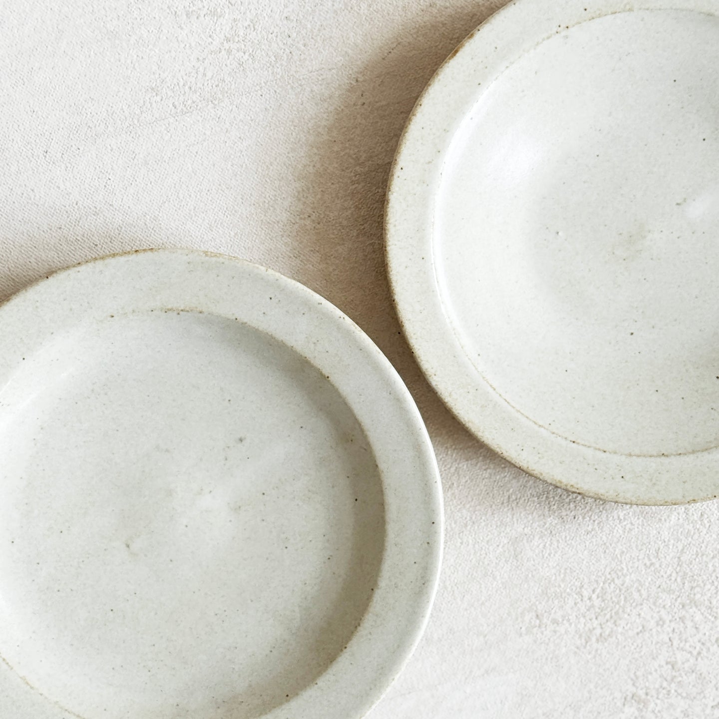 Footed Plate in Warm Cream
