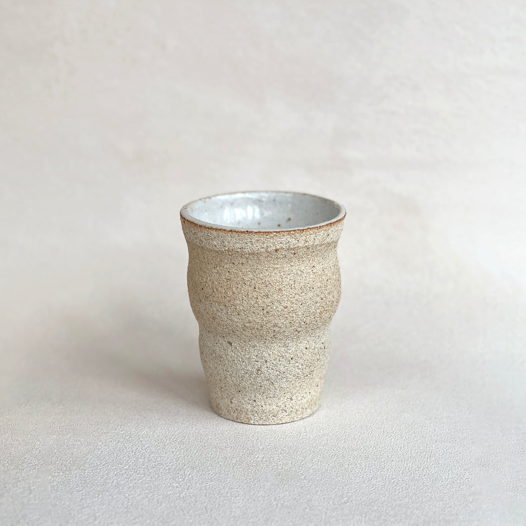 ripple vase in white sand